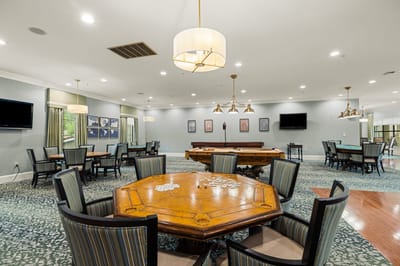 Interior view of a common area with seating and tables