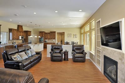 Modern lounge area with comfortable seating and a fireplace