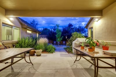 View of a serene outdoor space with tables and plants
