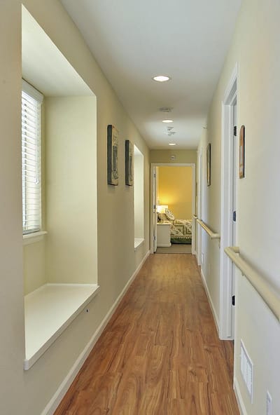 Bright hallway with windows and artwork
