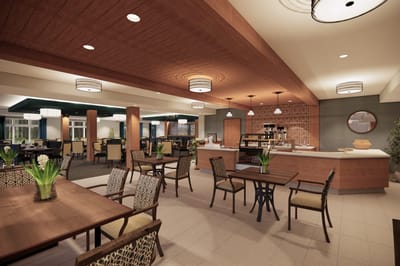 Interior view of a dining room with tables and chairs