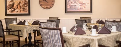 Elegant dining room setup with tables and decor