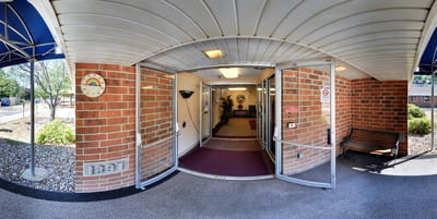Entrance of Azria Health Park Place with doors open