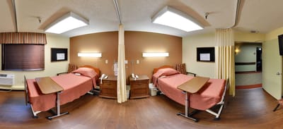 Interior view of a shared resident room with two beds