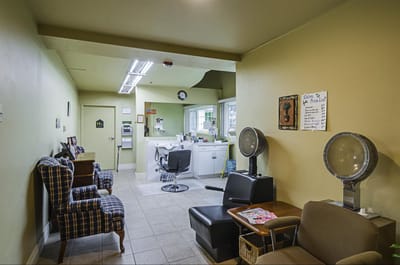 Interior view of a hair salon area in the facility
