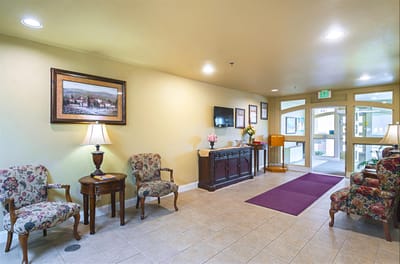 Bright lobby area with seating and decor