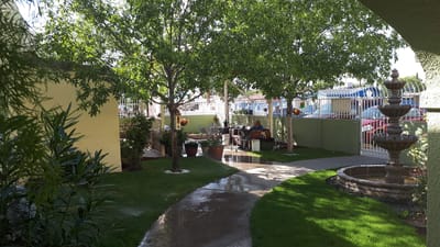 Outdoor space with residents enjoying the garden