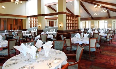 Elegant dining room with neatly set tables