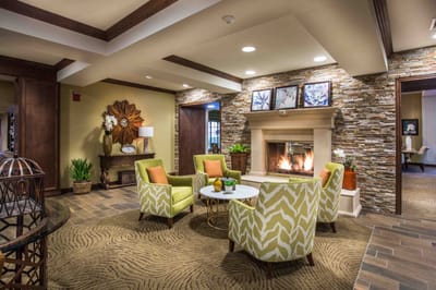 Cozy lounge area with a fireplace and seating