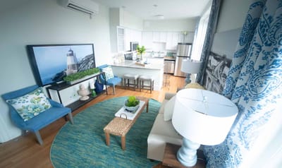 Bright, stylish living room interior in a senior facility.