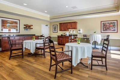 Bright common area with tables and chairs