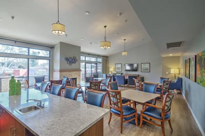Bright common area with seating and natural light