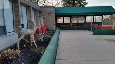 Exterior view of the facility with festive decorations
