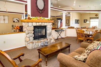 Cozy common area with a fireplace and seating