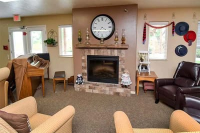 Cozy common area with a fireplace and seating