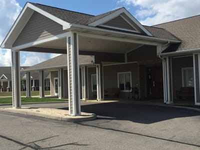 Entrance of an assisted living facility with roof overhang