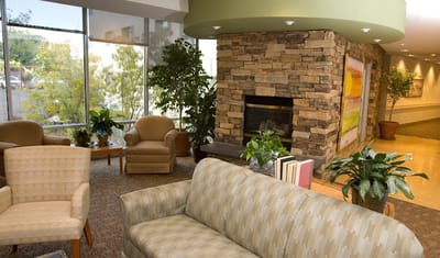 Bright common area with seating and plants
