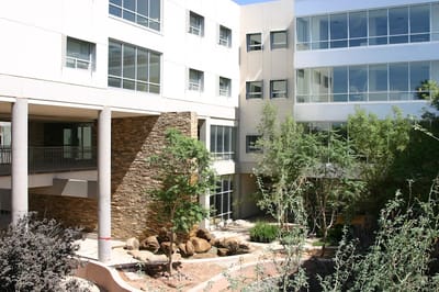Exterior view of the facility with landscaping