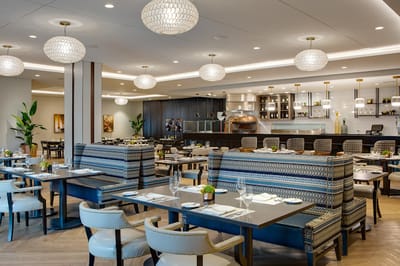 Elegant dining room with stylish decor and seating