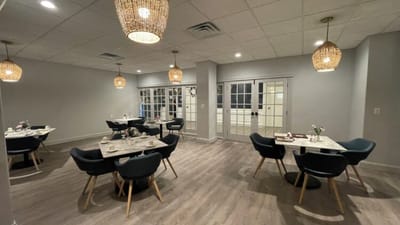 Dining area with modern decor and lighting