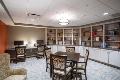 Interior common area with shelves and seating