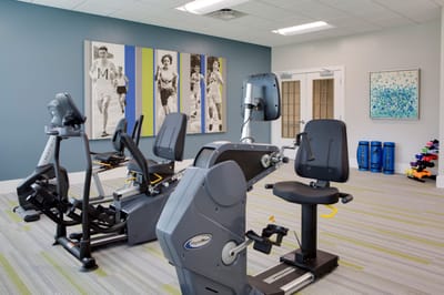 Well-equipped fitness room with exercise machines
