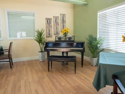 Interior view of a common area with a piano