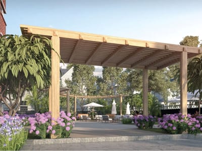 Outdoor patio area with seating and flowers