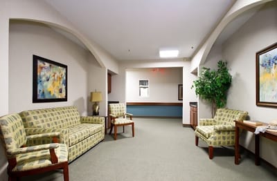 Common area with seating and artwork on walls