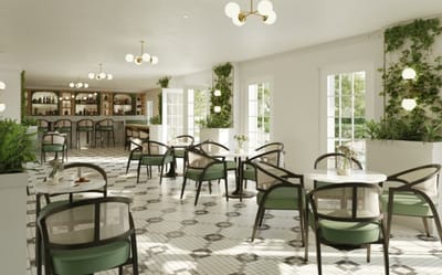 Bright dining area with white decor and greenery