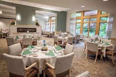 Elegant dining room setup with well-dressed tables