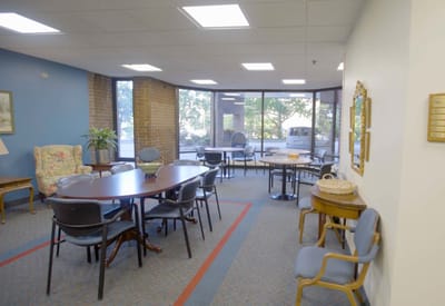 Common room with seating and large windows