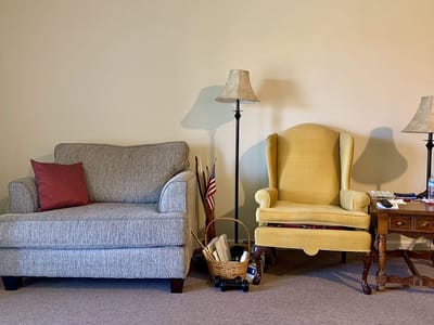 Cozy living room seating area with a warm atmosphere