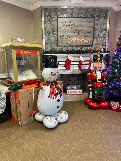 Festively decorated common area with holiday decorations
