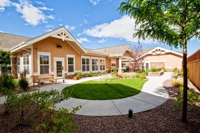 Beautiful outdoor garden area of a senior living facility