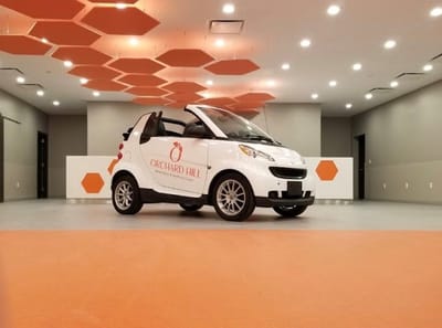 Facility-branded vehicle in a contemporary interior