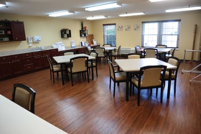 Dining area with tables and chairs set up
