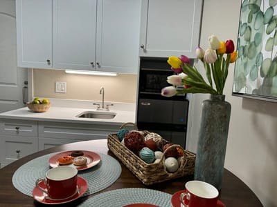 Cozy dining setup with flowers and snacks
