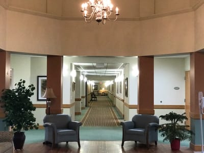Interior hallway with seating and decor