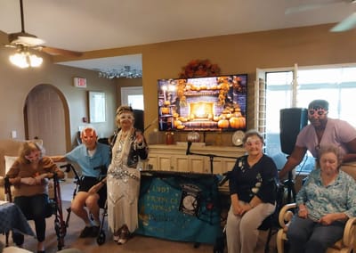 Residents participating in a themed activity in the common area