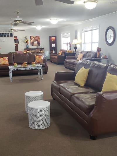 A cozy common area with seating and decorations