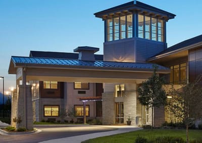 Exterior view of Senior Living facility at twilight