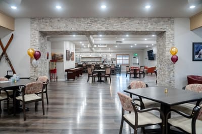 Bright dining area with tables and chairs