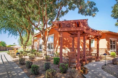 Outdoor seating area with shaded pergola