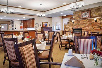 Bright dining room with decorated tables and chairs