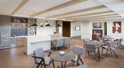 Bright and modern dining area with tables and chairs