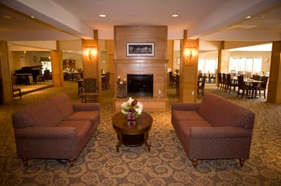 Common area with seating and a fireplace