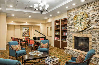 Cozy common area with seating and a fireplace