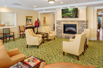 Interior common area with seating and fireplace