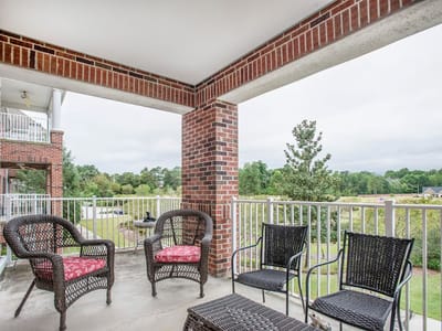 Outdoor seating area with chairs on a patio